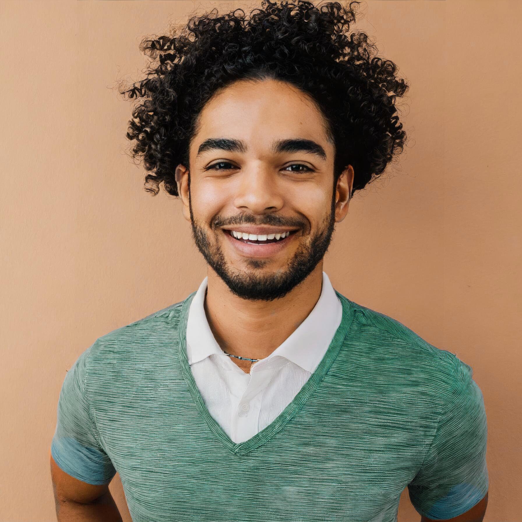 man smiling on orange background